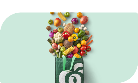 Woolworths grocery bag with veggies and fruit