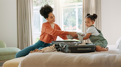 Family Packing a suitcase